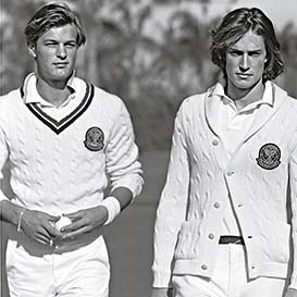 Image of Wimbledon players in white cable sweaters & pants