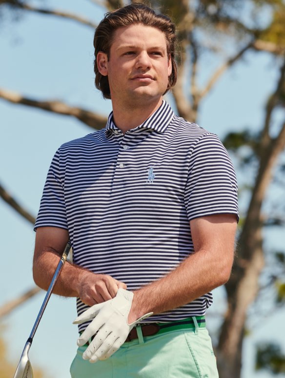 Man in golf Polo shirt with thin navy stripes